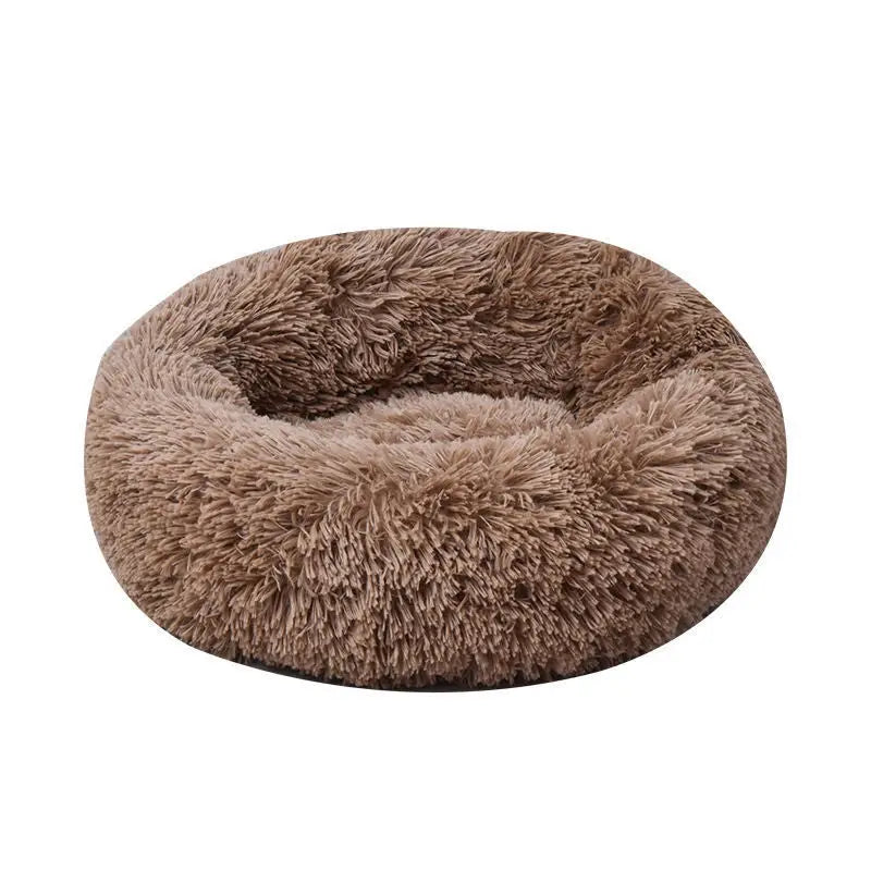 Cozy soft round pet bed in warm brown faux fur, designed for ultimate comfort and relaxation for pets.